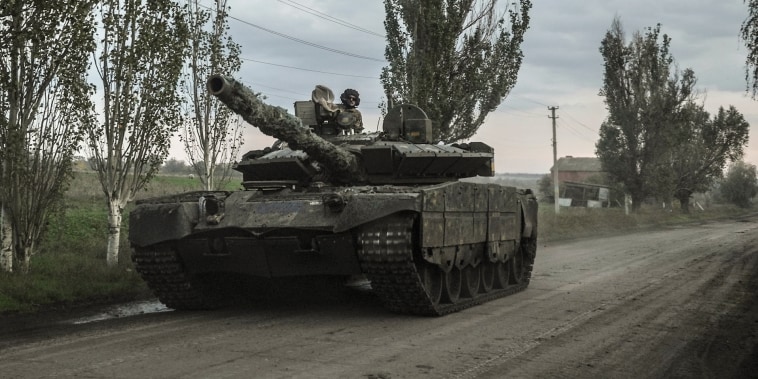 Ukrainian servicemen drive a tank on the way to Siversk, Donetsk region on Oct. 1, 2022.