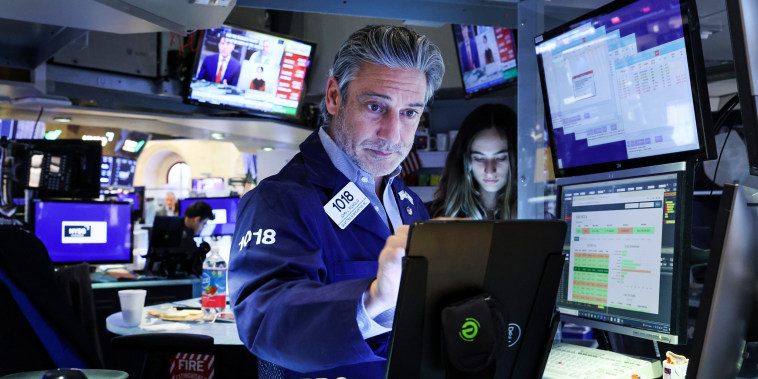 Traders work on the floor of the New York Stock Exchange on Sept. 23, 2022, in New York.
