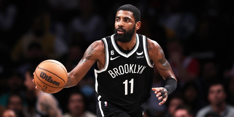 NEW YORK, NEW YORK - NOVEMBER 01: Kyrie Irving #11 of the Brooklyn Nets brings the ball up the court during the fourth quarter of the game against the Chicago Bulls at Barclays Center on November 01, 2022 in New York City. NOTE TO USER: User expressly acknowledges and agrees that, by downloading and or using this photograph, User is consenting to the terms and conditions of the Getty Images License Agreement.