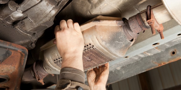 A catalytic converter is removed from a vehicle.