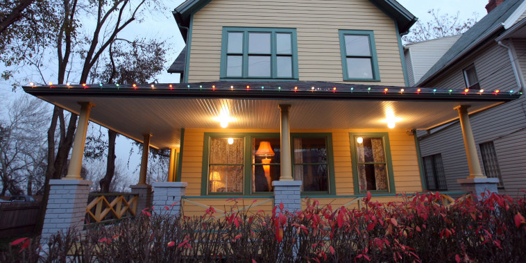 A "leg lamp" glows in the window of "A Christmas Story House and Museum" in Cleveland.