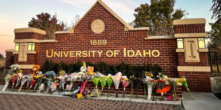 Flowers are left at a make-shift memorial honoring four slain University of Idaho students in Moscow, Idaho.