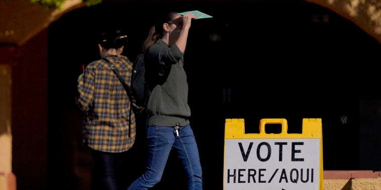 A voter arrives to cast their ballot  in Guadalupe, Ariz., on Nov. 8, 2022.