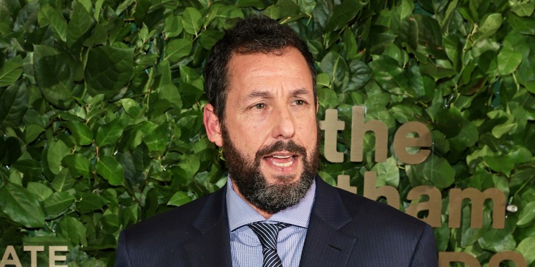 Adam Sandler with the Performer Tribute award at The Gotham Awards