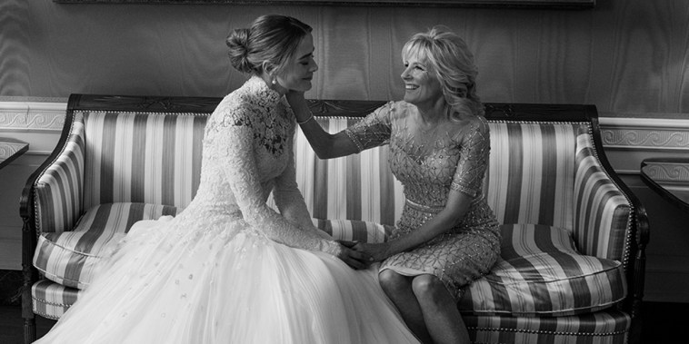 Naomi Biden in her Ralph Lauren wedding dress and First Lady Jill Biden in Reem Acra. Photographed at the White House by Norman Jean Roy, Vogue, Winter 2022.