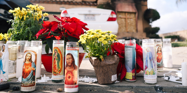 A memorial outside a home where three people were found dead in a burning home in Riverside, Calif., on Nov. 28, 2022.