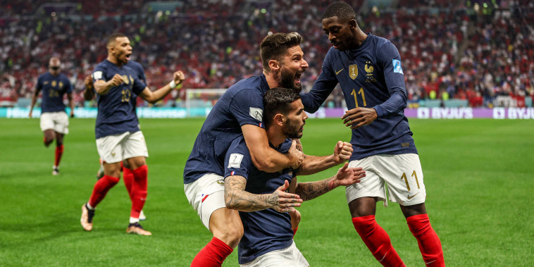 Image: France's defender #22 Theo Hernandez celebrates with teammates after scoring his team's first goal during the Qatar 2022 World Cup semi-final football match between France and Morocco at the Al-Bayt Stadium in Al Khor, north of Doha on Dec. 14, 2022.