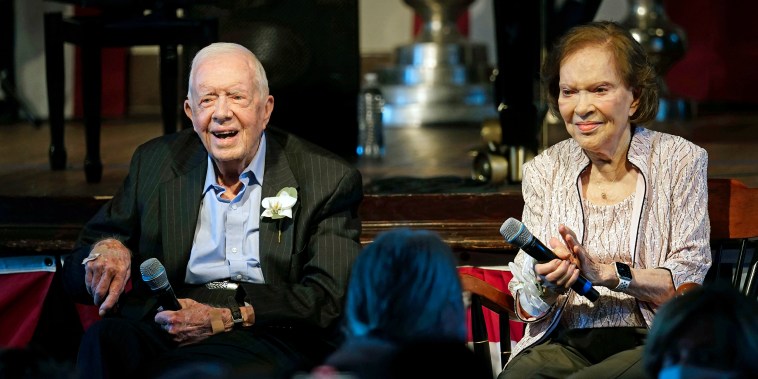 FILE - Former U.S. President Jimmy Carter and his wife, former first lady Rosalynn Carter, sit together during a reception to celebrate their 75th wedding anniversary on Saturday, July 10, 2021, in Plains, Ga. On Thursday, Aug. 18, 2022, Carter, the second-oldest U.S. first lady ever, turns 95. (AP Photo/John Bazemore, Pool, File)