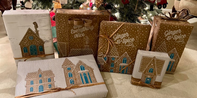 The Trader Joe's paper bags look festive under the tree.