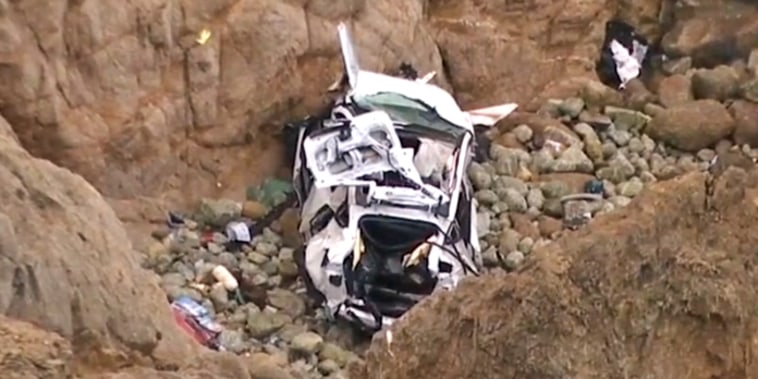 Aerial view of a Tesla that plunged over a cliff in San Mateo County. 