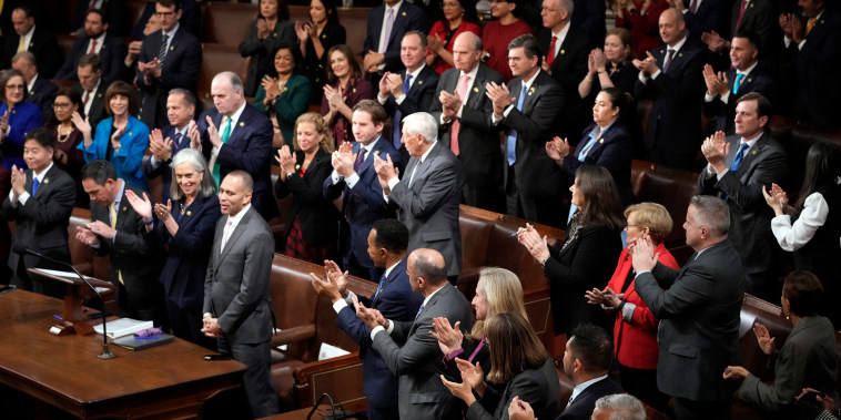 Rep. Hakeem Jeffries, D-N.Y., stands after being nominated in the House chamber as the House meets for a second day to elect a speaker and convene the 118th Congress