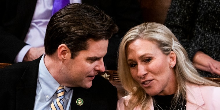 Republican Reps. Marjorie Taylor Greene and Rep. Matt Gaetz on the House floor during a vote for Speaker on Jan. 5, 2023.