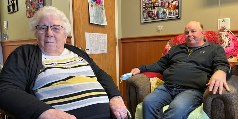 Marjorie Kruger visits with son Dan White in her new room at the Evangelical Lutheran Good Samaritan Society nursing home in Waukon, Iowa. Kruger transferred to the Waukon facility in September 2022, because Good Samaritan was closing its Postville, Iowa, home, where she lived for six years.