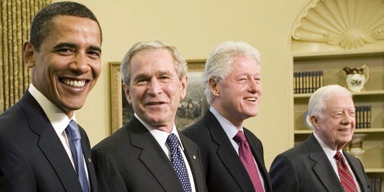 Barack Obama, George W. Bush, Bill Clinton and Jimmy Carter in the Oval Office on Jan. 7, 2009.
