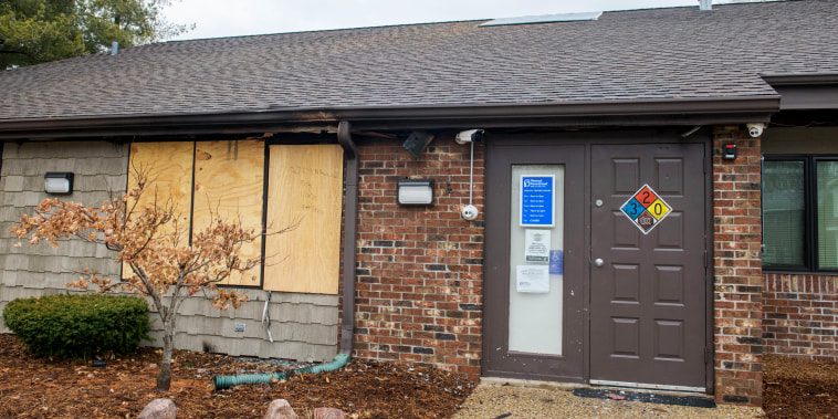 A front window is boarded up at the Planned Parenthood Health Center in Peoria, Ill., on Jan. 15, 2023.  