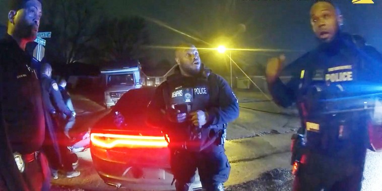 Police officers talk after the attack on Tyre Nichols during an arrest in Memphis, Tenn.