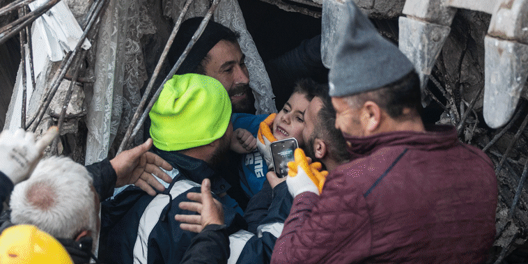 Turkish boy rescued from the rubble after 52 hours is reunited with his mother. 