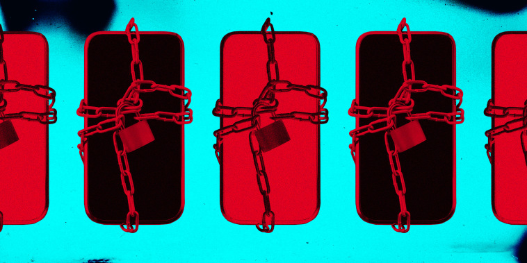 Photo illustration of phones with chains and locks around them, cast in red.