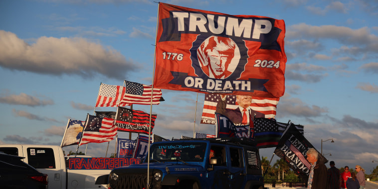 Donald Trump's supporters near his Mar-a-Lago home in Palm Beach, Fla., on March 20, 2023.