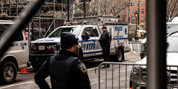 New York Police Department (NYPD) officers outside the office of Manhattan District Attorney Alvin Bragg in New York on March. 24, 2023.