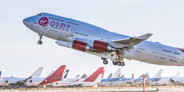 Virgin Orbit's carrier aircraft Cosmic Girl takes off from Mojave Air and Space Port in California with LauncherOne underwing for the company's Tubular Bells: Part One mission on June 30th, 2021. 