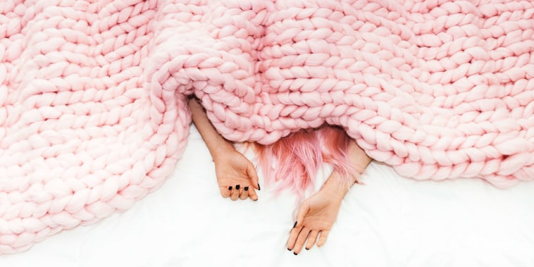 Woman Under Blanket