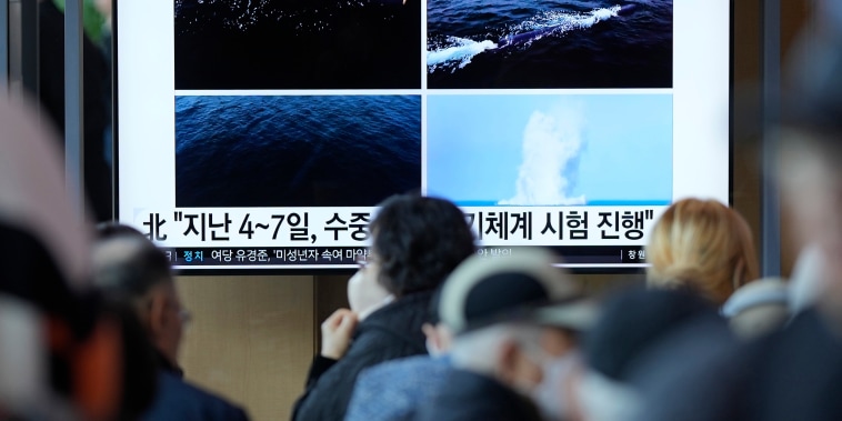 People watch the news of North Korea's underwater attack drone at the Seoul Railway Station