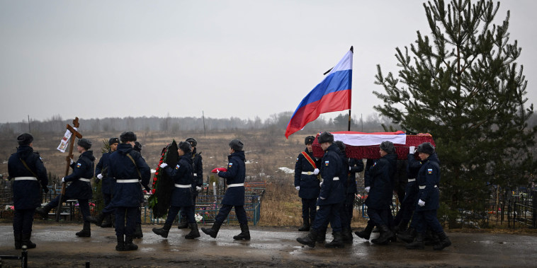 A funeral ceremony for a fallen Russian soldier at a cemetery in Tula Oblast, Russia