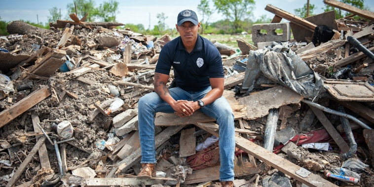 Police officer Robert Barfield Jr. at a destroyed mobile home park where he rescued tornado victims in Rolling Fork, Miss. 