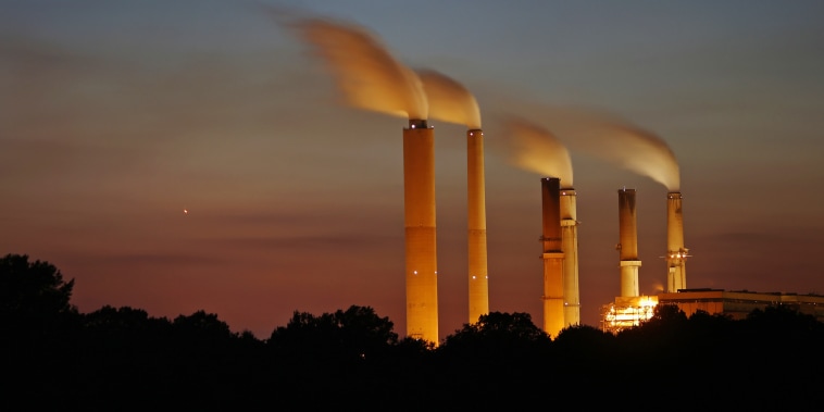 Emissions rise from stacks of the Duke Energy Corp. Gibson Station power plant at dusk in Owensville, Ind., in 2015.