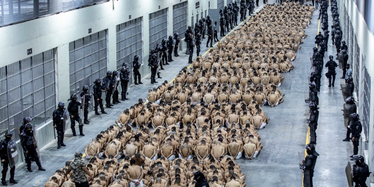 Inmates identified by authorities as gang members are seated in the Terrorism Confinement Center in Tecoluca, El Salvador, on March 15, 2023.