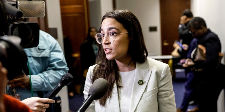 Image: Rep. Alexandria Ocasio-Cortez, D-N,Y., speaks to reporters after attending a House Democrat caucus meeting with White House debt negotiators at the U.S. Capitol on May 31, 2023.