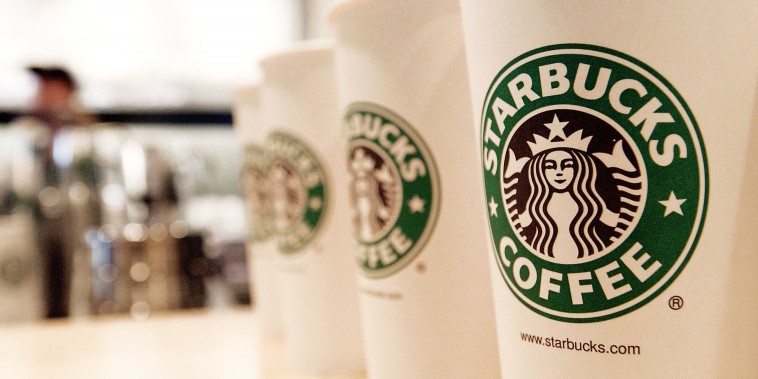 Beverage cups featuring the logo of Starbucks Coffee.
