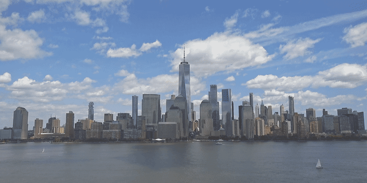 The New York city skyline on June 5, before, and June 7, during, the smoke from the Canadian wildfires.