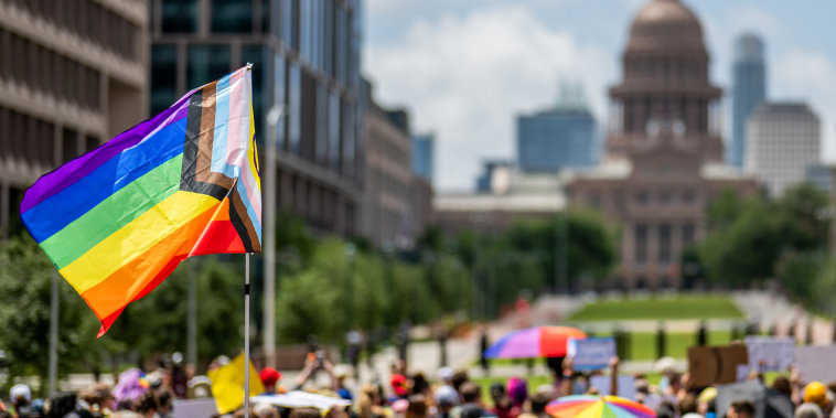 People march in Austin to protest legislation aimed at the LGBTQ+ community on April 15, 2023.