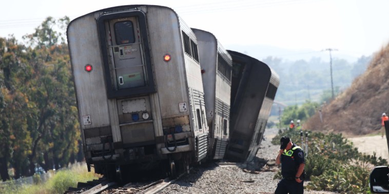 Amtrak train with nearly 200 passengers derails after hitting water truck on tracks in Southern California
