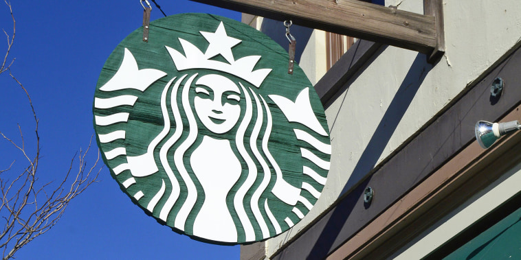 A sign with the Starbucks Coffee logo.