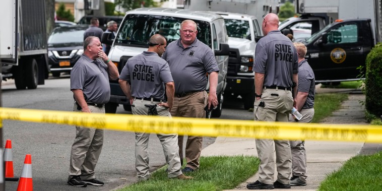 Image: Authorities continue to work at the home of suspect Rex Heuermann in Massapequa Park, N.Y., on July 24, 2023. 