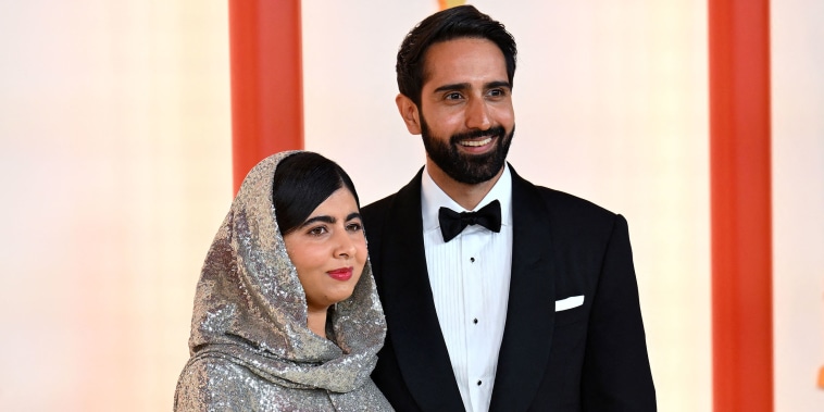 Pakistani activist Malala Yousafzai and her husband Asser Malik attend the 95th Annual Academy Awards at the Dolby Theatre in Hollywood, California on March 12, 2023. 