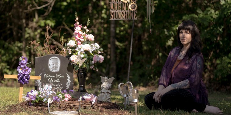 Autumn Wells' mother Taylor Wells at her daughter’s final resting place at the family cemetery plot in Belmont, Miss., on July 30, 2023.
