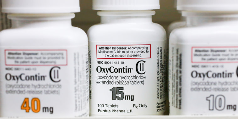 Bottles of Purdue Pharma L.P. OxyContin medication sit on a pharmacy shelf in Provo, Utah on  Aug. 31, 2016.