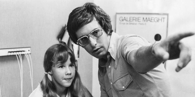 Director William Friedkin explaining the next scene to Linda Blair during the making of "The Exorcist" in 1972.