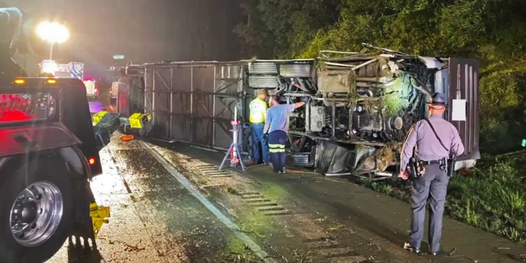 An overturned bus on i-81 southbound in Dauphin County, Pa., on Aug. 7, 2023.