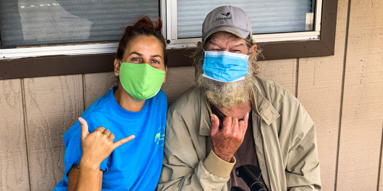 Former director of the Maui Rescue Alliance Jelena Dackovic, and Rex Cole.