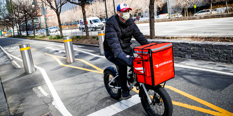 A DoorDash delivery worker in New York on March 16, 2020.