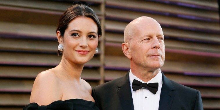 Actor Bruce Willis and his wife Emma Heming arrive at the 2014 Vanity Fair Oscars Party in West Hollywood