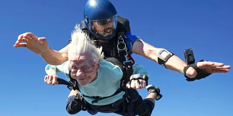 Dorothy Hoffner skydives with tandem jumper Derek Baxter