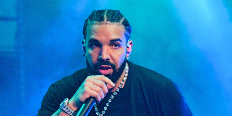 Rapper Drake performing onstage.