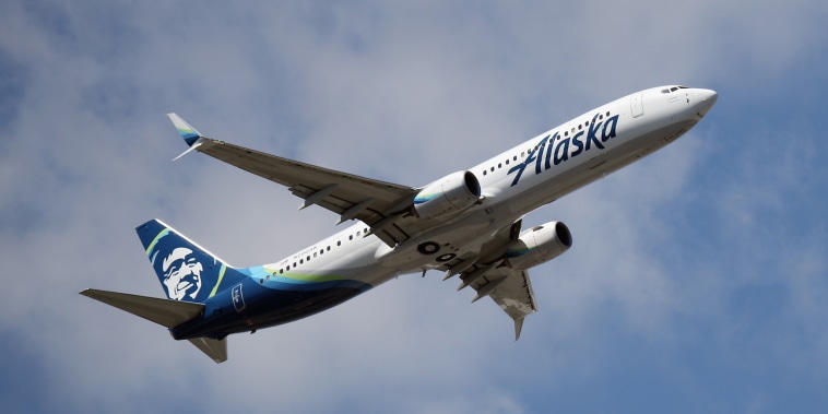 A Boeing 737-990 operated by Alaska Airlines takes off from JFK Airport in the Queens, N.Y.