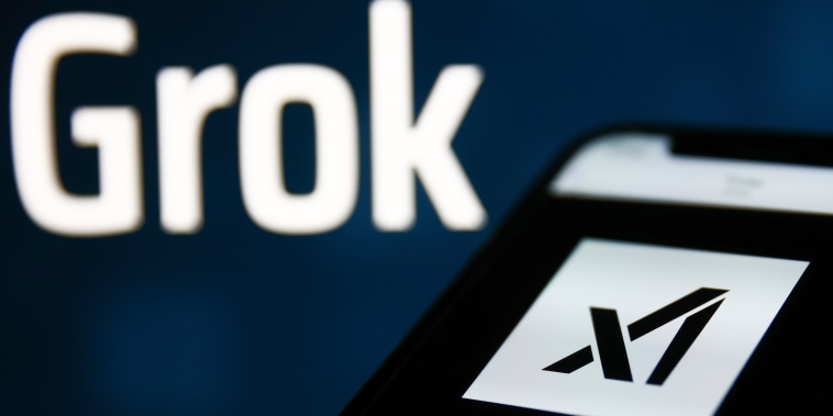 Grok sign on xAI website displayed on a laptop screen and xAI logo on website displayed on a phone screen are seen in this illustration photo taken in Krakow, Poland on Nov. 6, 2023. 